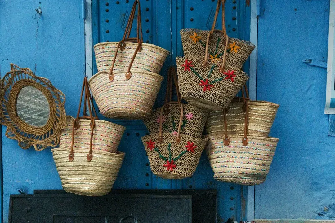 Natural fibre open-weave beach tote with leather handles